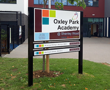 Post sign for a Primary School with sections for Principal name below