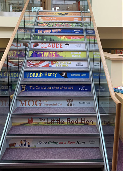 Book spine stair graphic signage for schools