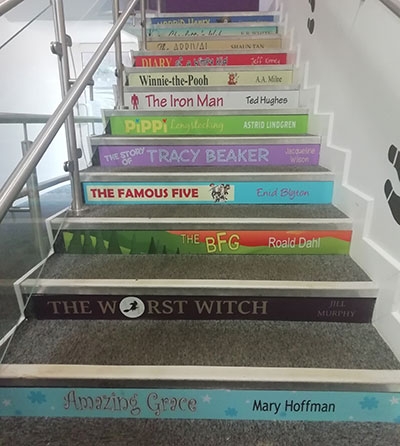 Book spine stair graphic for schools LKS2