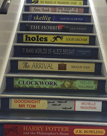 Book spine stair graphics for a Junior School