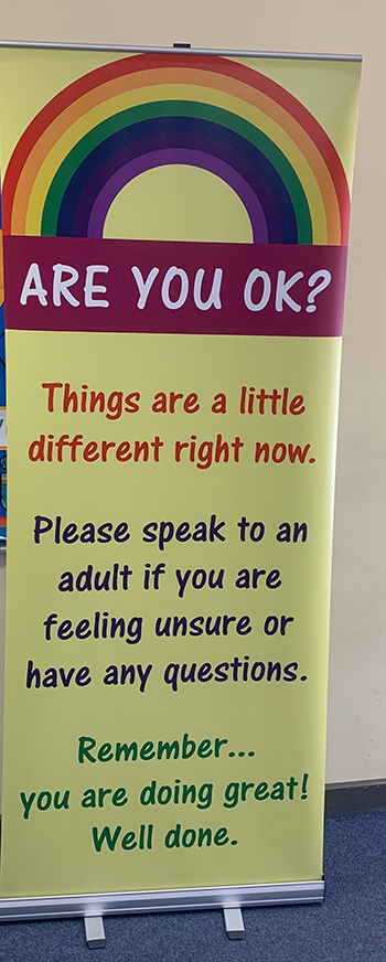 Banner stand for a Primary School asking pupils if they are ok during the Coronavirus Covid 19 times