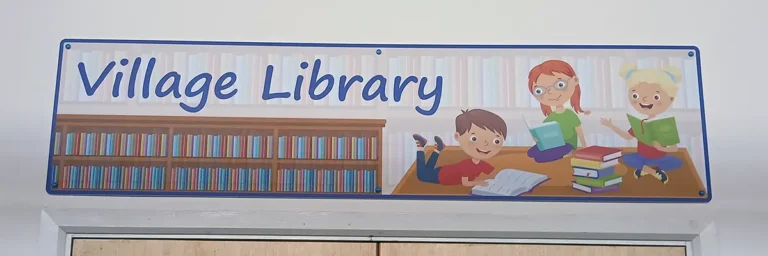 library-signage-howe-park-school-milton-keynes-3 Library sign on a wall above the door to the library - Howe Park School, Milton Keynes